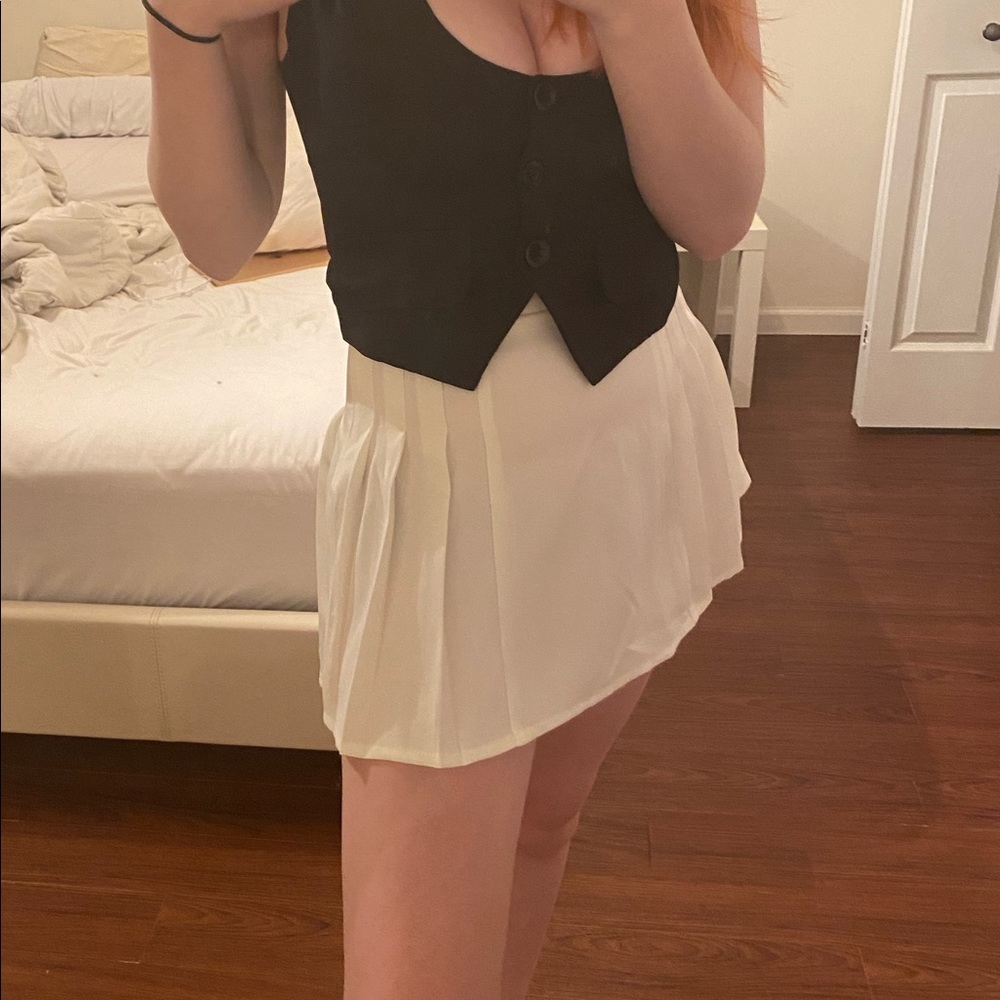 White pleated skirt